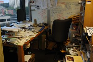 messy office full of small business documents