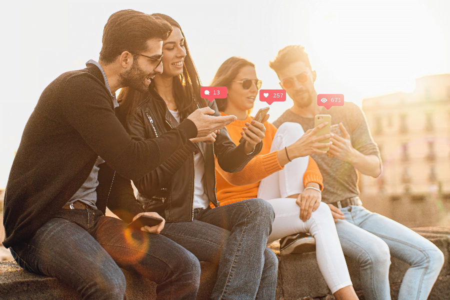group of people looking at social media