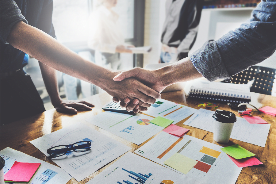 two people shaking hands