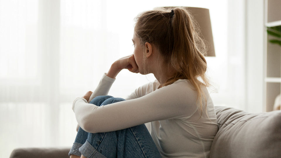 How Toxic Productivity Can Derail Your Best Laid Plans as a Small Business Owner 3 girl gazing thoughtfully out the window